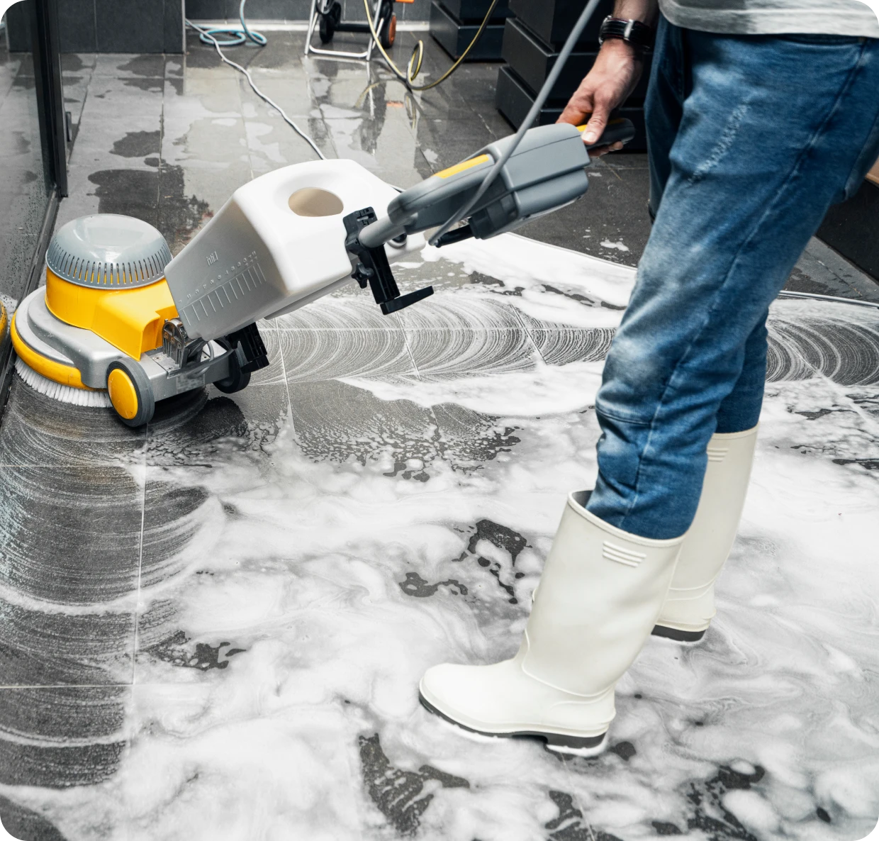 Floor cleaning with a machine and foam